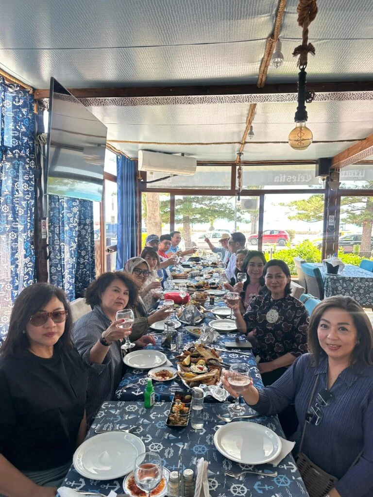 Small TravelToko group sharing a meal together